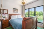 Queen bedroom suite with direct views over the pond